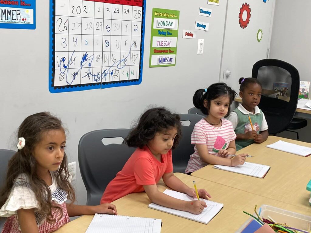 A group of kids learning together